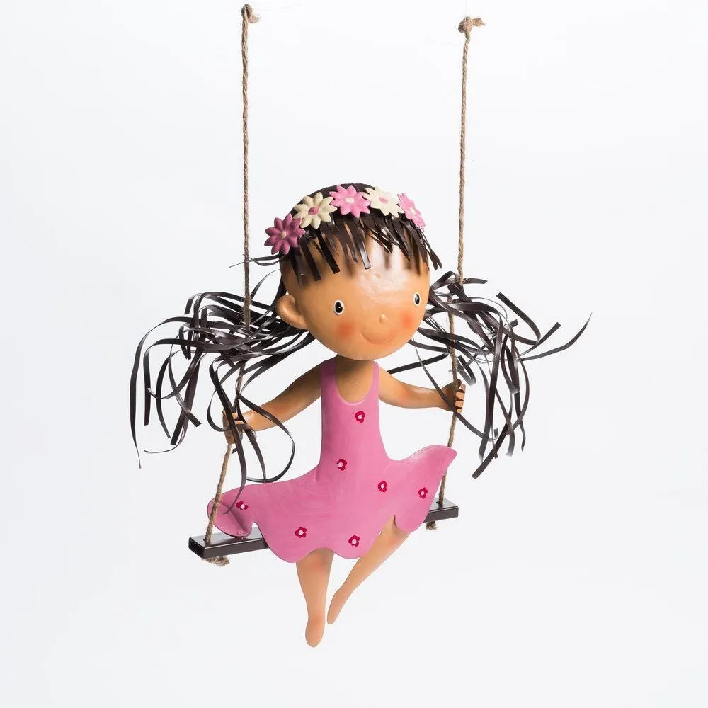 Fille sur balançoire en métal L 40 x H 38 cm